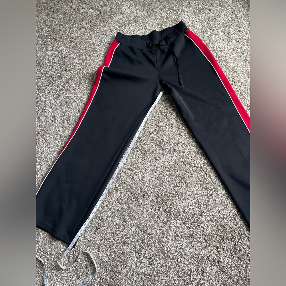 New York  & Company Woman’s Track Pants in SZ L in gently used condition